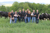Fairmont Farm, family with cows in field
