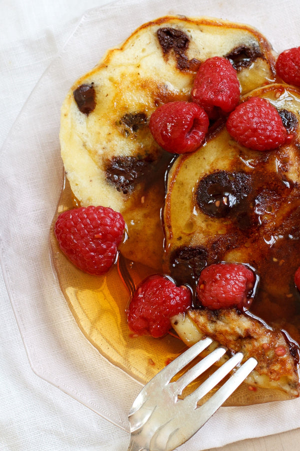 Chocolate Chunk Pancakes with Fresh Raspberry Maple Syrup
