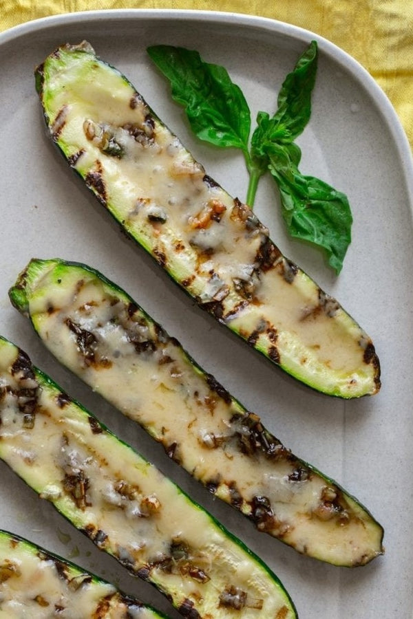 Grilled Cheddar Zucchini Boats with Balsamic Leeks