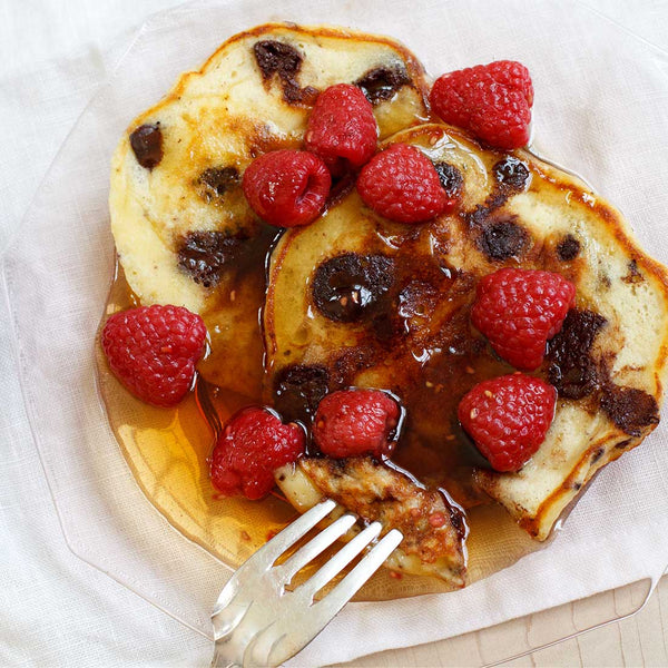 Chocolate Chunk Pancakes with Fresh Raspberry Maple Syrup
