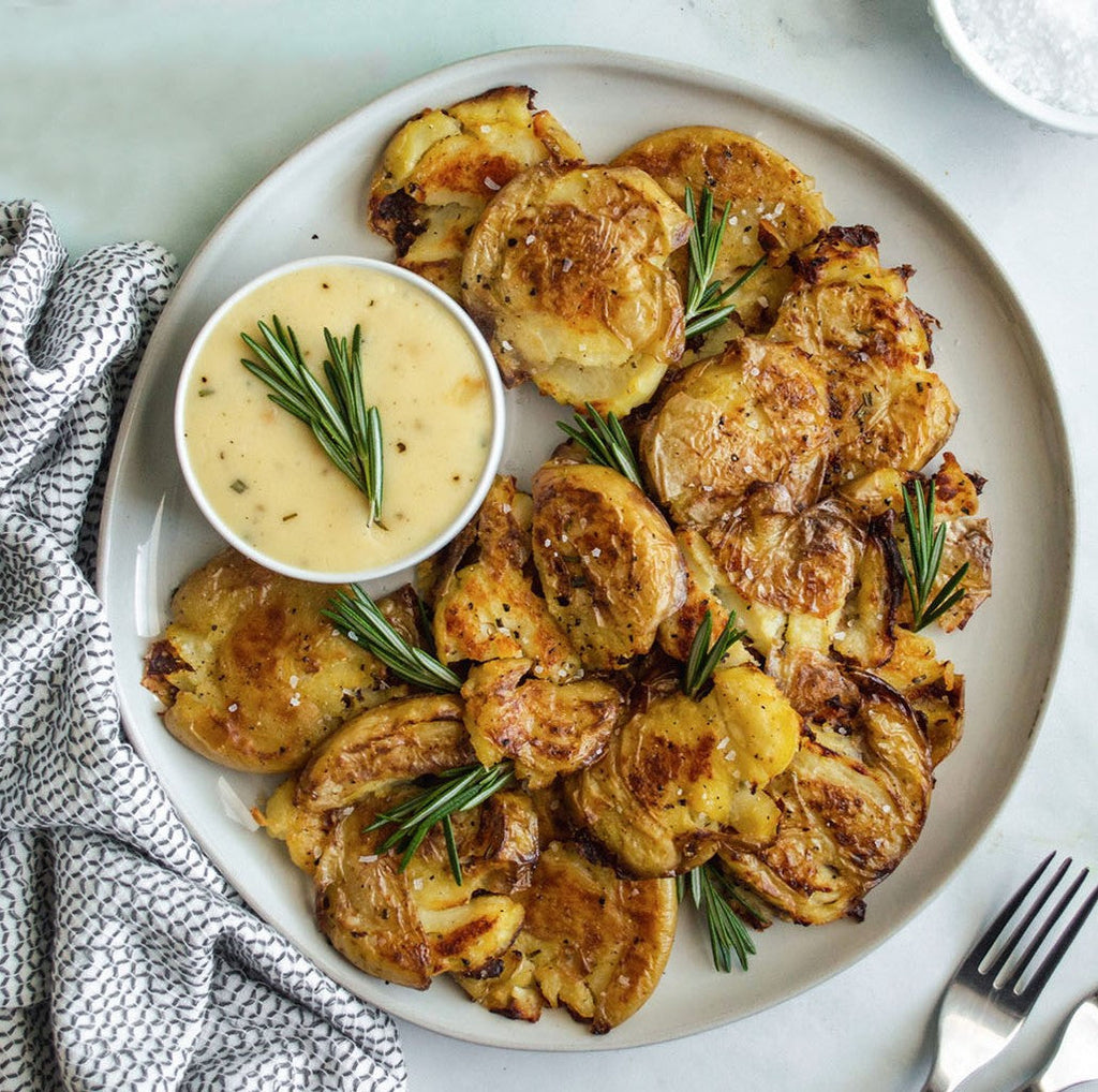 Crispy Garlic Smashed Potatoes with Cheddar Rosemary Dip