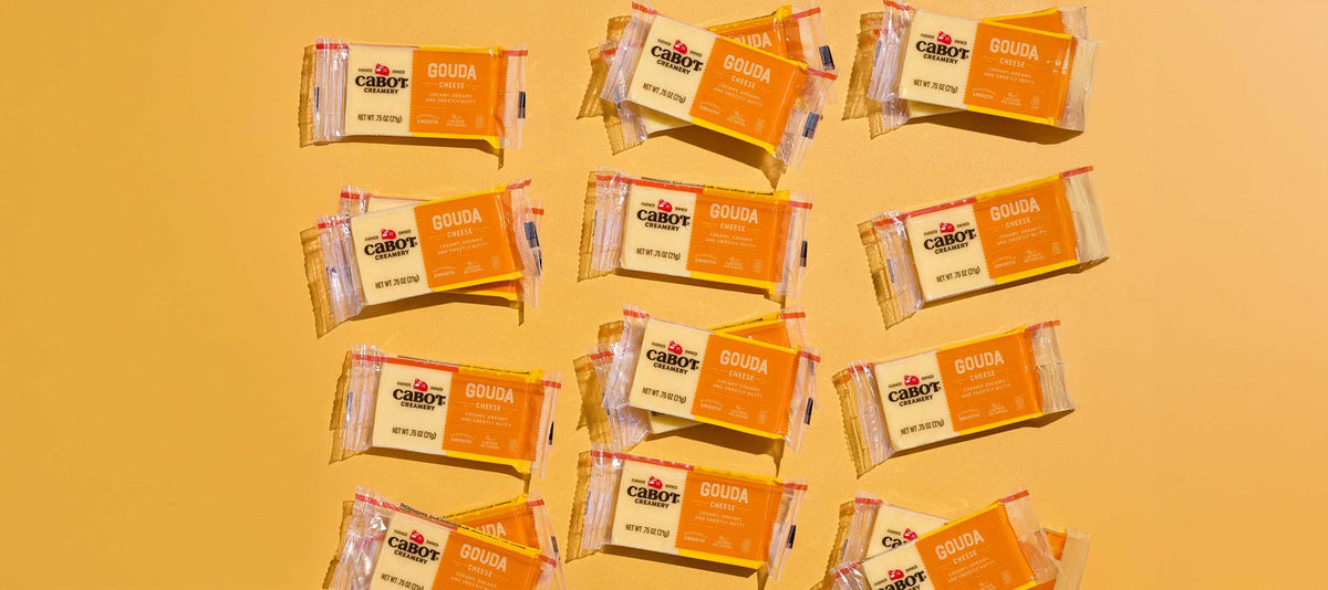 Cabot Gouda Snack Bars on an orange background