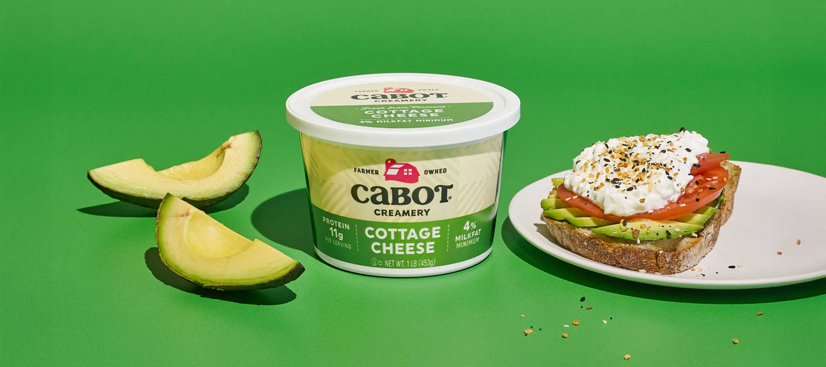 Cabot Cottage Cheese with Avocado on toast on green background