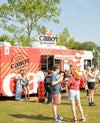 People enjoying food at the Cabot Cruiser Food Truck Event