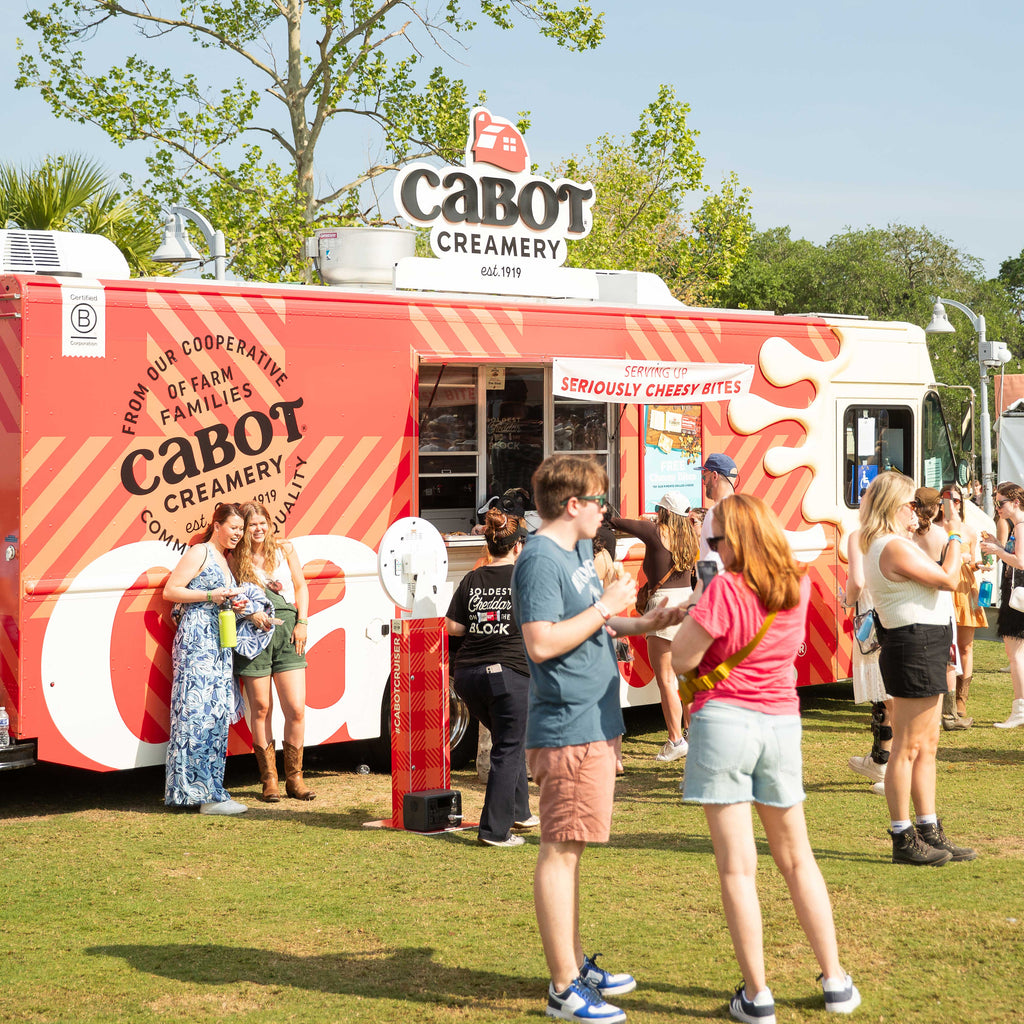 People enjoying food at the Cabot Cruiser Food Truck Event