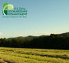 US Dairy Stewardship Commitment logo over field image