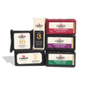 The Cabot Creamery Aged Cheddar Collection features six cheddar blocks in assorted varieties and colors, including vintage choice and private stock, all beautifully arranged in two stacks.