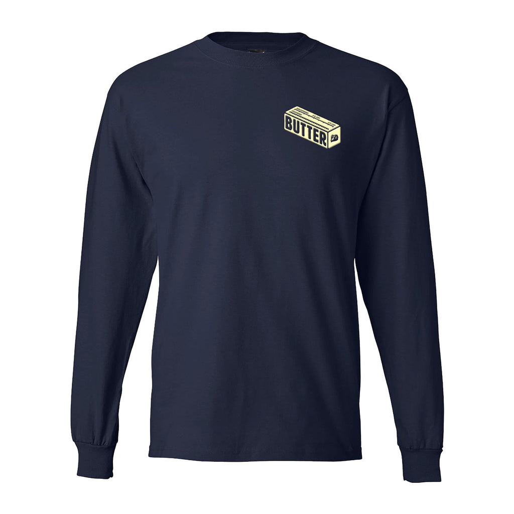 The New Duds Butter Long Sleeve T-shirt is a heavyweight navy tee made from 100% ring-spun cotton, featuring a small butter stick graphic and BUTTER on the upper left chest.