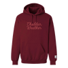 The Cheddar Weather Chainstitched Hoodie by New Duds is a maroon heavyweight fleece pullover featuring “Cheddar Weather” chainstitched in cursive on the chest, a front pocket, and a small tag on the lower left side—making it an ideal cozy Vermont hoodie for chilly days.
