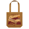 Geiger Northeast’s Where Life is Cheddar Tote is a brown Vermont-themed bag featuring the phrase “Where Life Is Cheddar” and an illustrated countryside print with cows, a barn, trees, mountains, and a sign reading Vermont—capturing the charm of Cabot cooperative country life.