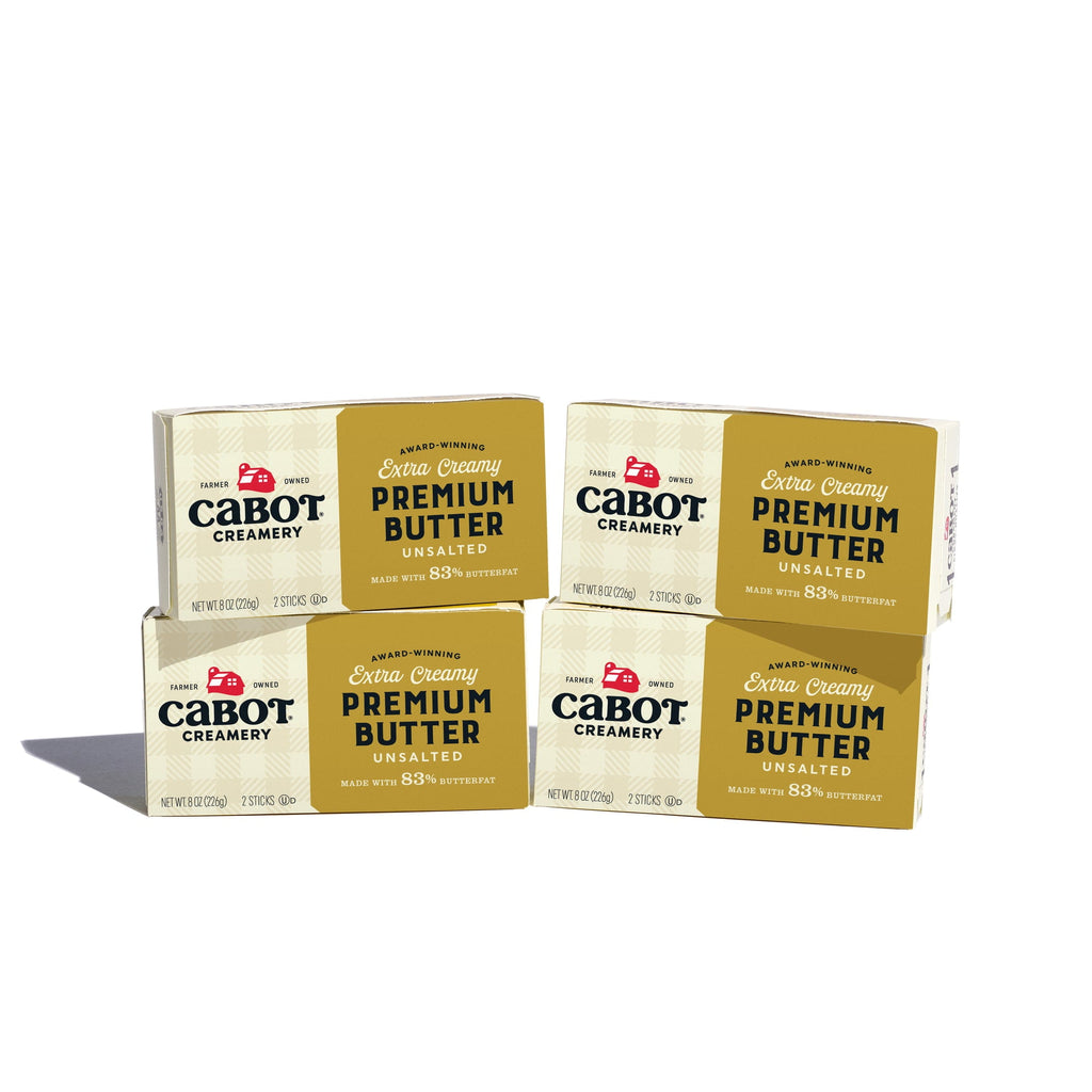A group of Cabot Creamery Baker's Butter (Unsalted 4 Pack) boxes, perfect for baking delicious pastries.