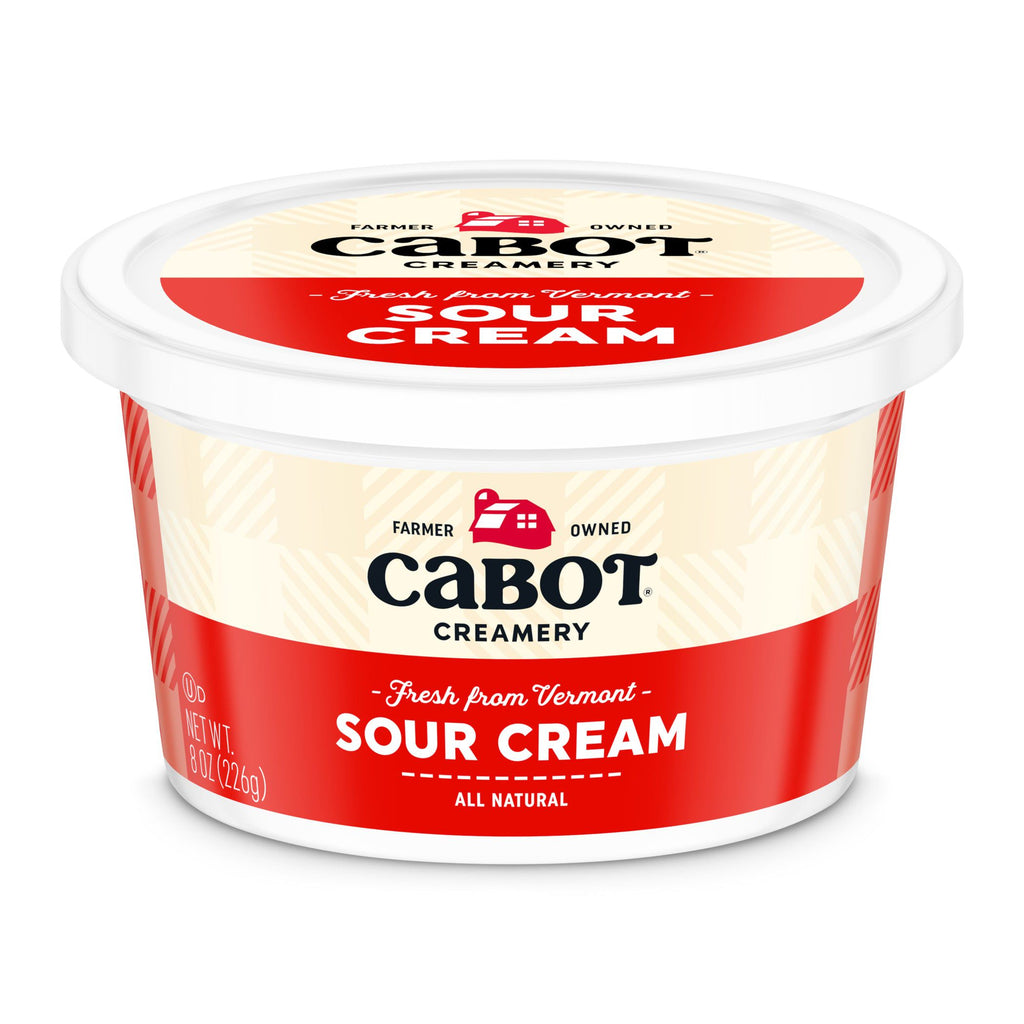Cabot Creamery Sour Cream, in an 8 oz (227g) container with a red and cream-colored label that says Fresh from Vermont, All Natural, is perfect for enhancing your favorite family dinner dishes.