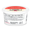 A round white tub of Cabot Creamery French Onion Dip displays its label and nutrition facts. The container has a red and white lid with black text listing ingredients and manufacturer details.
