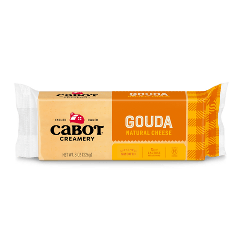 Cabot Creamery Gouda Cheese is a rectangular 8-ounce block in orange and white packaging. Enjoy this creamy, protein-rich snack with Cabot quality for any occasion.