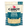 An 8 oz bag of Cabot Creamery Mac & Cheese Cheddar Cheese features farmer-owned co-op pride in cream and blue plaid packaging, with a blend of Alpine and Vermont Sharp Cheddar.
