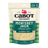 An 8 oz package of Cabot Creamery Monterey Jack Cheese features a green and cream plaid design and highlights its farmer-owned origins, mild flavor, and lactose free status.