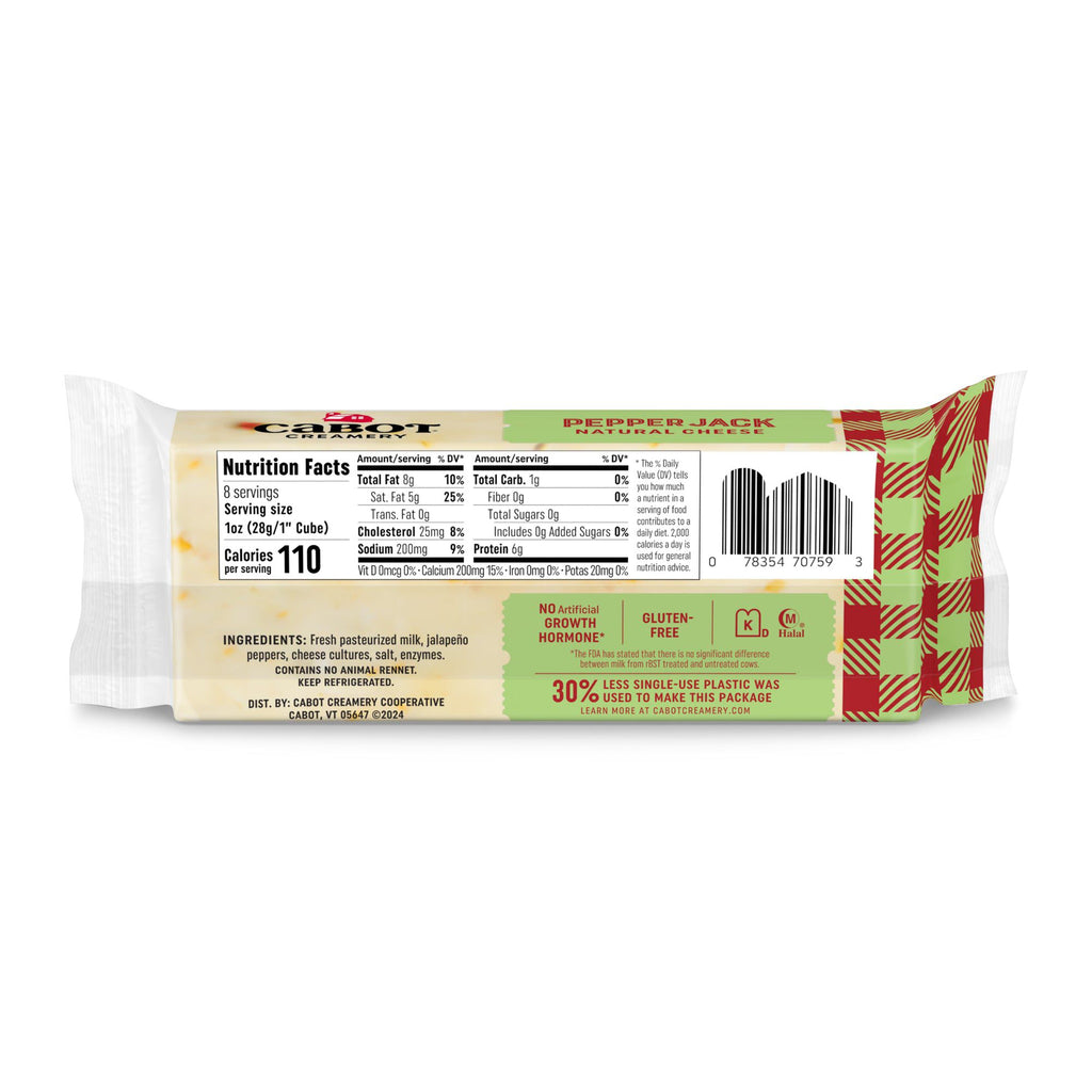 The back of a Cabot Creamery Pepper Jack Cheese block shows nutrition facts, ingredients, and gluten-free, halal, and kosher labels. The packaging displays a red and green plaid pattern.