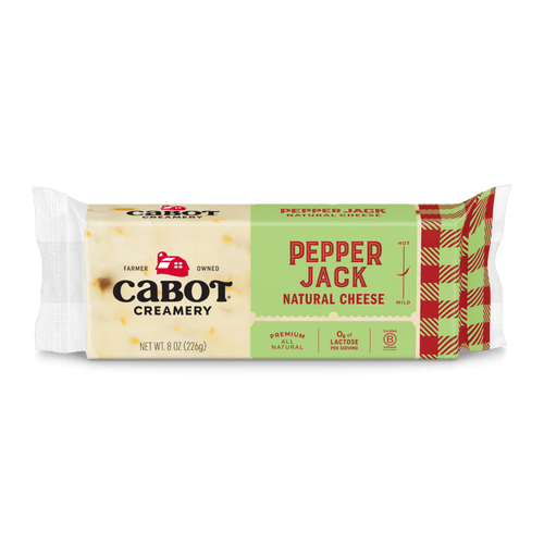 Cabot Creamery Pepper Jack Cheese, 8 oz—spicy, premium natural, and lactose-free. Farmer-owned and perfect for nachos or favorite recipes, it comes in a red and yellow plaid package.