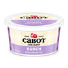 A 12 oz Cabot Creamery Ranch Dip comes in a container with a white lid and a light purple and cream label featuring the Cabot logo, product name, and Farmer Owned above the logo for this tangy ranch dip.