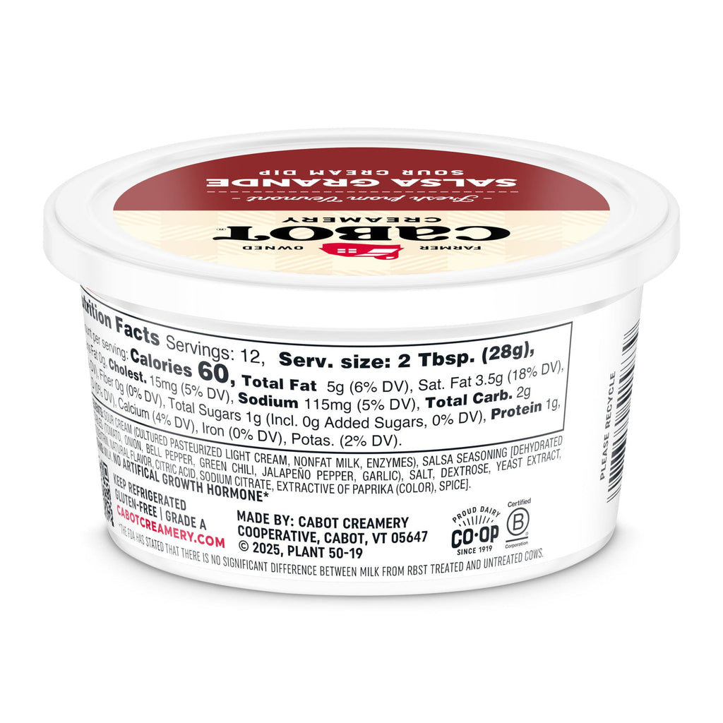 A round white tub of Cabot Creamery Salsa Grande Dip sits at an angle, displaying nutrition facts and company info. The lid shows the Cabot logo and bold red text—perfect for dipping chips or adding zest to your favorite dishes.