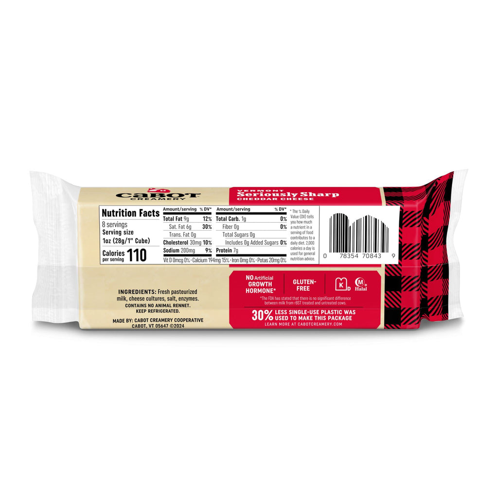 Back of a Cabot Creamery Seriously Sharp Cheddar Cheese bar showing nutrition facts, ingredients, barcode, "Gluten-Free" and "30% Less Plastic" labels, all in classic red and black plaid Cabot Creamery packaging.