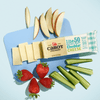 Cabot Creamery Lite50 Sharp Cheddar Cheese is sliced on a blue surface with apple slices, strawberries, and cucumber sticks for a tasty, low-fat snack.