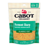 An 8 oz package of Cabot Creamery Vermont Sharp Yellow Cheddar Cheese, shredded in classic cut style. The green and cream plaid packaging displays key product info and has a window revealing the shredded cheese inside.