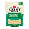 Cabot Creamery Vermont Sharp Cheddar Cheese, 8 oz, is lactose free and comes pre-shredded in green and cream packaging with a farmhouse logo and clear window for easy viewing.