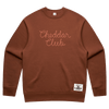 The Cheddar Club Chainstitched Crewneck by New Duds is a brown sweatshirt with chain-stitched Cheddar Club lettering, a Cabot Creamery logo patch near the hem, and is crafted from cozy upcycled fibers.