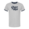 The Cheese the Day Ringer T-shirt by New Duds is a light gray unisex tee with dark blue collar and sleeve trim, featuring bold "Cheese the Day" lettering on the front—perfect for cheese lovers.