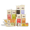The Cabot Creamery Fan Favorites Cheese Gift Box features a selection of cheddar blocks and slices in flavors such as Smoky Bacon, Garlic Herb, Alpine, Wildly Horseradish, Gouda, Pepper Jack, Seriously Sharp, Wickedly Habanero, and Everything Bagel.