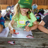 Girl at Farm doing Farm Love Activity