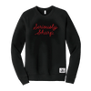 The New Duds Seriously Sharp Chainstitch Crewneck is a black sweatshirt featuring “Seriously Sharp” embroidered in red cursive on the chest, with a small rectangular patch near the left bottom hem.