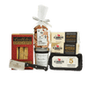 A Salty & Sweet Gift Pack featuring a box of crackers, milk chocolates, fruit preserve, a cheese knife, and three blocks of Cabot cheese for a perfect cheese and chocolate pairing.