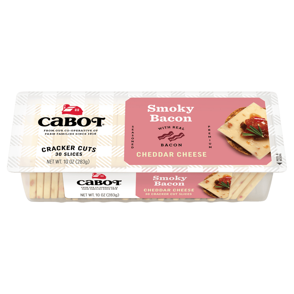 Cabot Creamerys Smoky Bacon Cheddar Cheese Cracker Cuts offer 30 savory slices packaged with a plaid design. Weighing 10 oz, they feature cheese on crackers with bacon and hickory smoke for robust flavor.