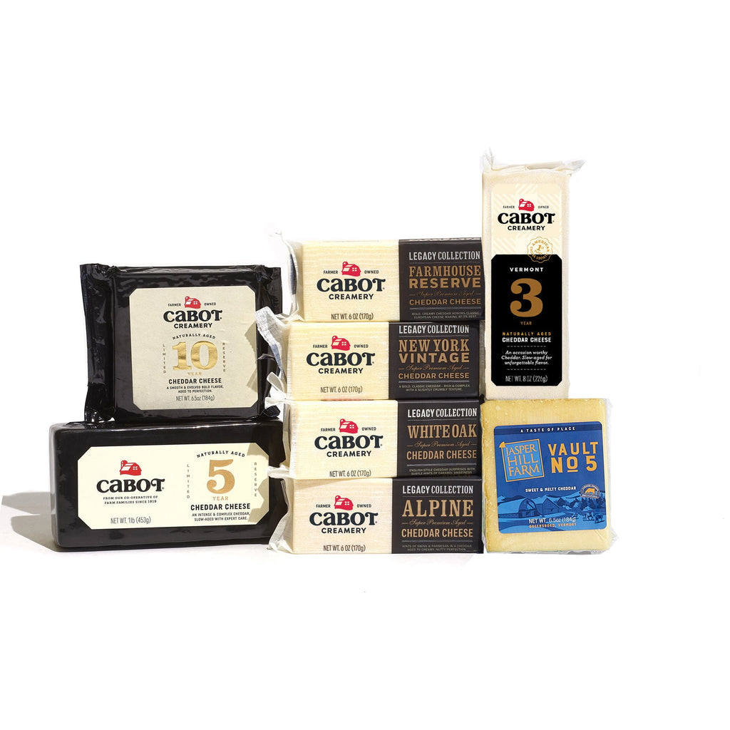 Cheese, Please Cheddar Medley by Cabot Creamery features a selection of their finest cheddar cheeses arranged on a white background.