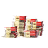 Cabot Creamery Seriously Sharp Cheddar Cheese Snacks, 50 ct, are stacked in rows against a white background. Each snack bar is individually wrapped, featuring red and black packaging.