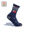 The Darn Tough Vermont Cabot x Darn Tough Socks, Eclipse, feature a blue and gray design with a red barn. Displayed upright on a white background, the label notes that 10% of sales support Vermont Adaptive Veteran Ventures.