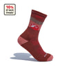 The Cabot x Darn Tough Socks in Chestnut by Darn Tough Vermont are shown upright with a mountain design on a white background. A badge in the top left states 10% of sales go to Vermont Adaptive.