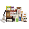 The Cabot X That Cheese Plate: Ultimate Charcuterie Gift Box by Cabot Creamery includes cheeses, crackers, olives, nuts, cured meats, fruit preserves, a cheese knife, and bowl—perfectly arranged for an impressive charcuterie board.