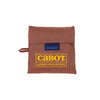 The Cabot x Always With Honor Baggu by Baggu is a brown, square fabric pouch with a flap, blue BAGGU label, yellow CABOT x ALWAYS WITH HONOR logo on the front, and a small loop on the left side.