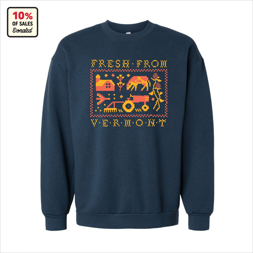 The Cabot x Always With Honor Crewneck by New Duds is a limited edition navy unisex sweatshirt with a pixel-style cow, barn, tractor, and crops design. Features FRESH FROM VERMONT text and a badge noting 10% of sales are donated.