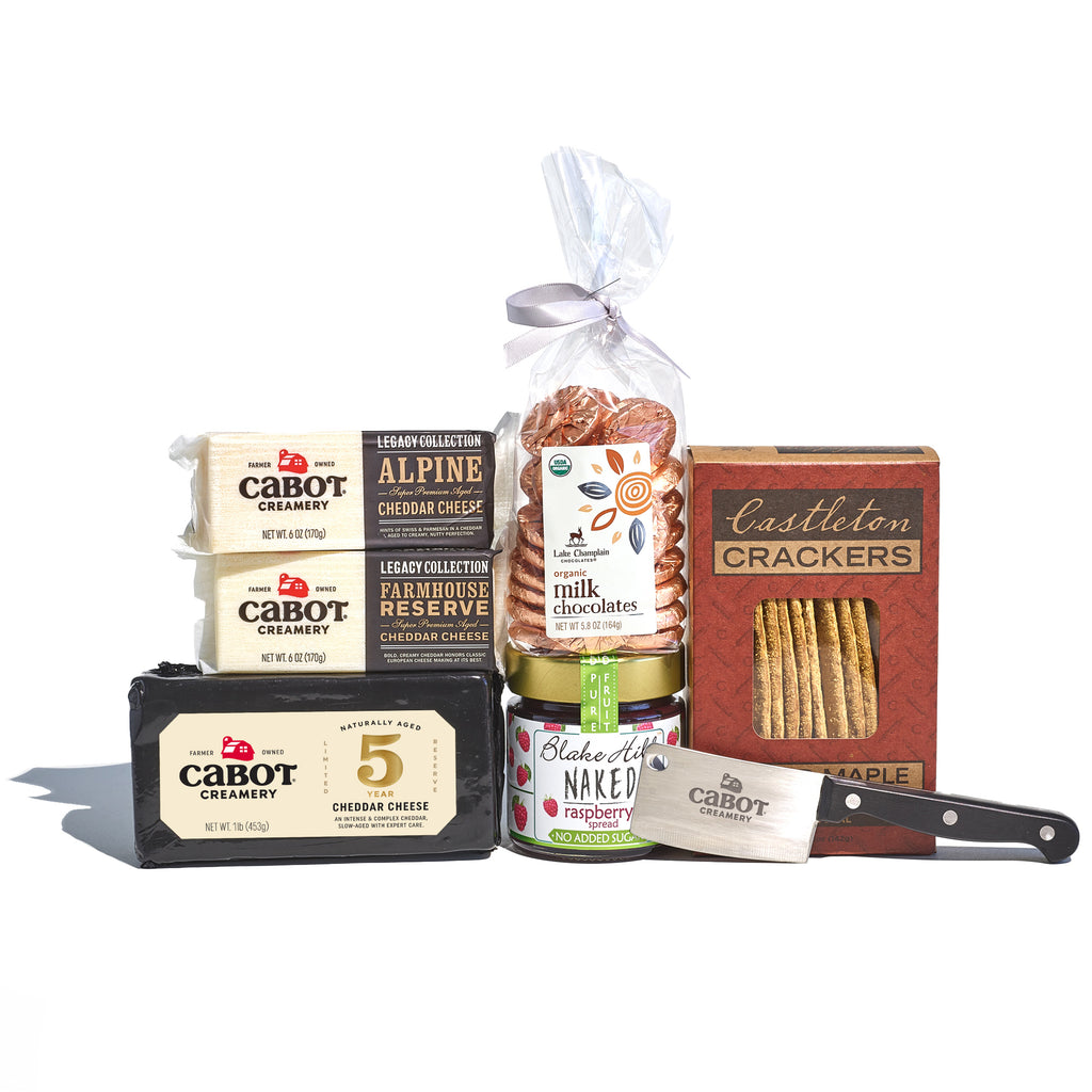 Experience the Salty & Sweet Gift Pack from Cabot Creamery, featuring Cabot cheeses and Castleton crackers, complemented by Blake Hill raspberry spread and Lake Champlain chocolates. Includes a Cabot-branded cheese knife, Alpine and Farmhouse Reserve cheddars for the perfect chocolate pairing.