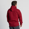 A person wearing the New Duds Cheddar Weather Chainstitched Hoodie and dark pants is standing with their back to the camera against a plain light background.
